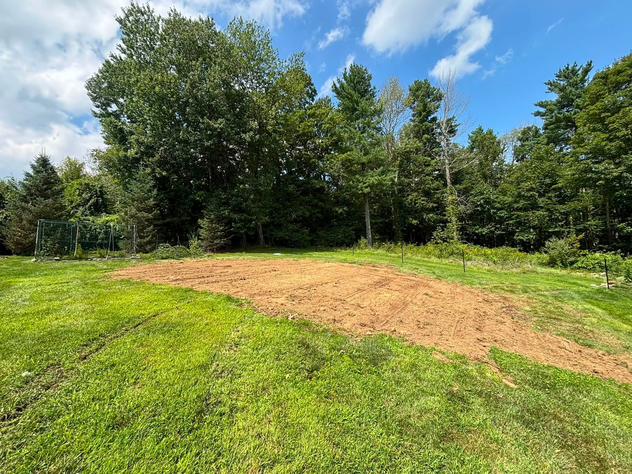 Completed regrade — yard ready for loam and seed